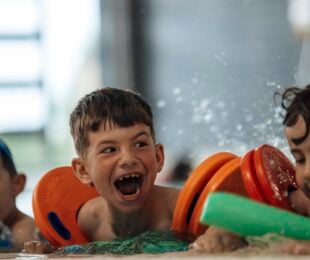 a group of kids enjoying fun and floats