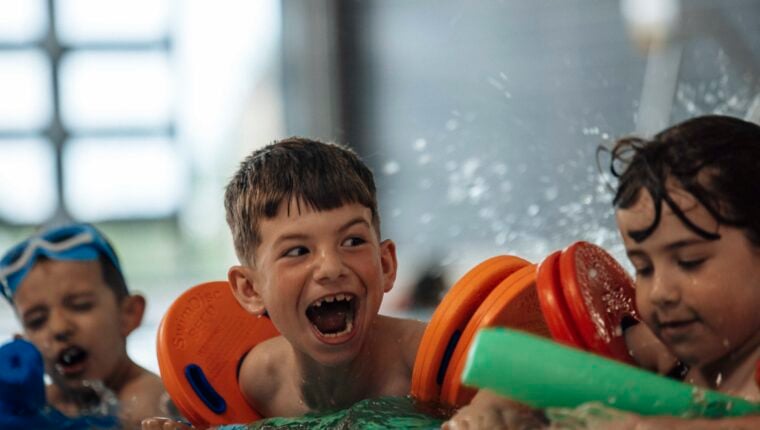 a group of kids enjoying fun and floats