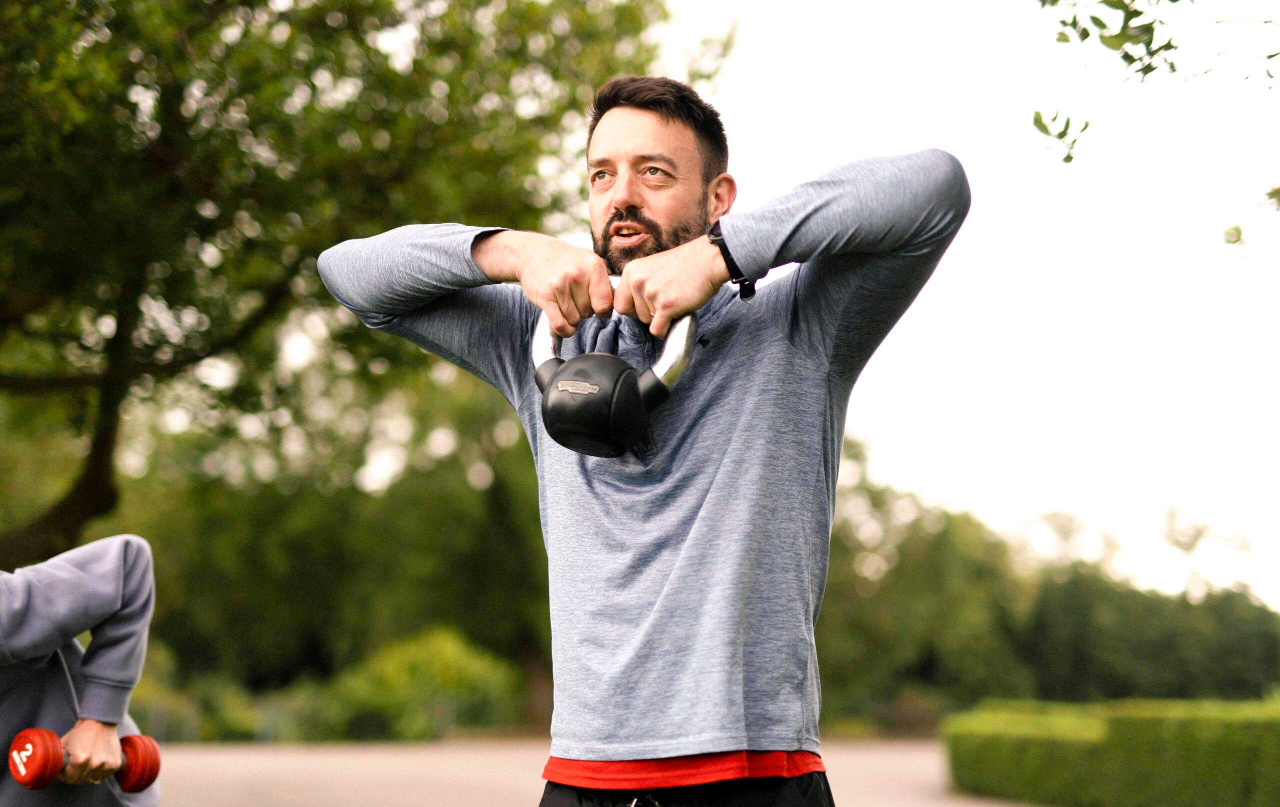 Man lifting weight at the park