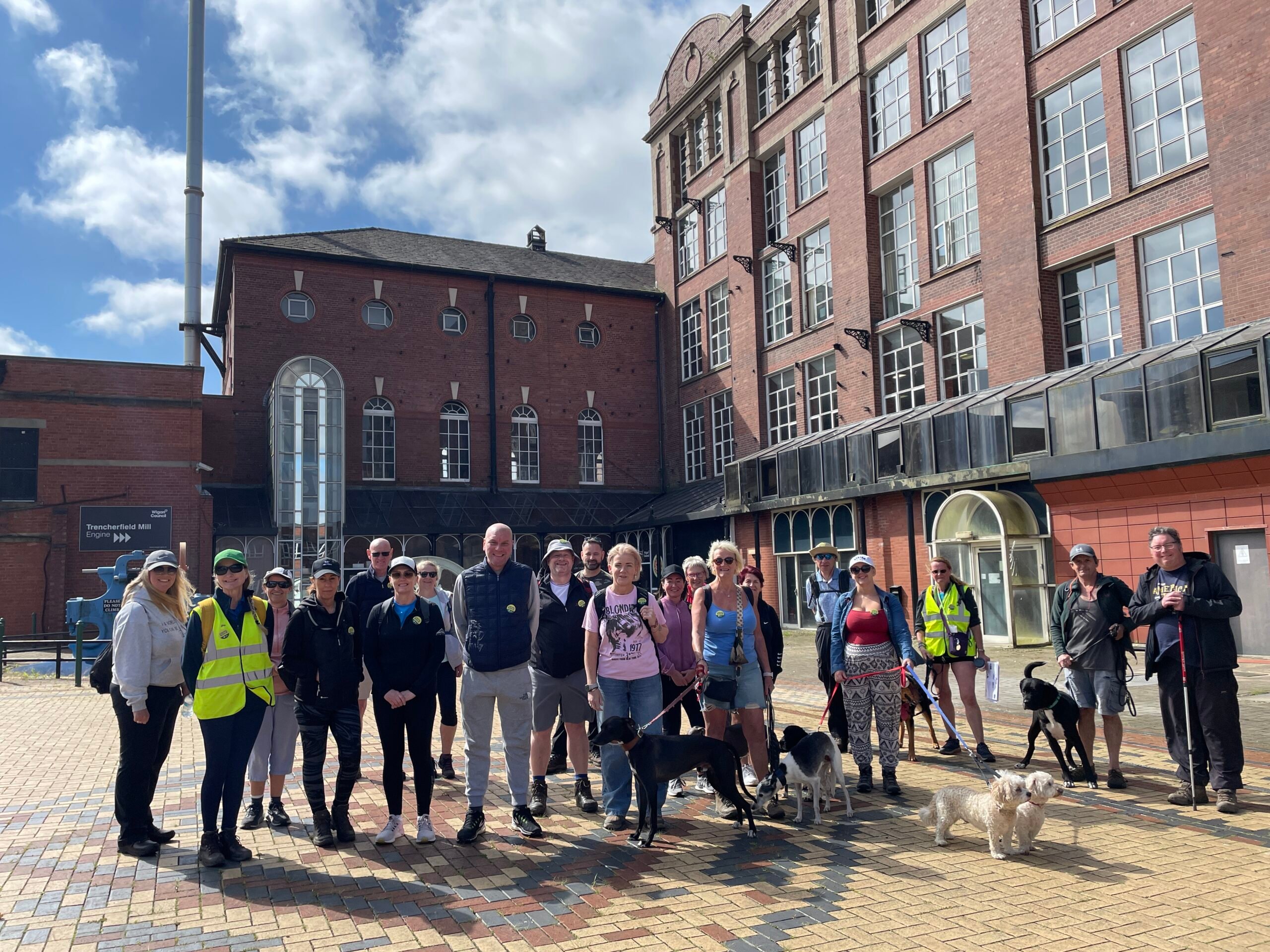 A group of walkers at Trencherfield Mill