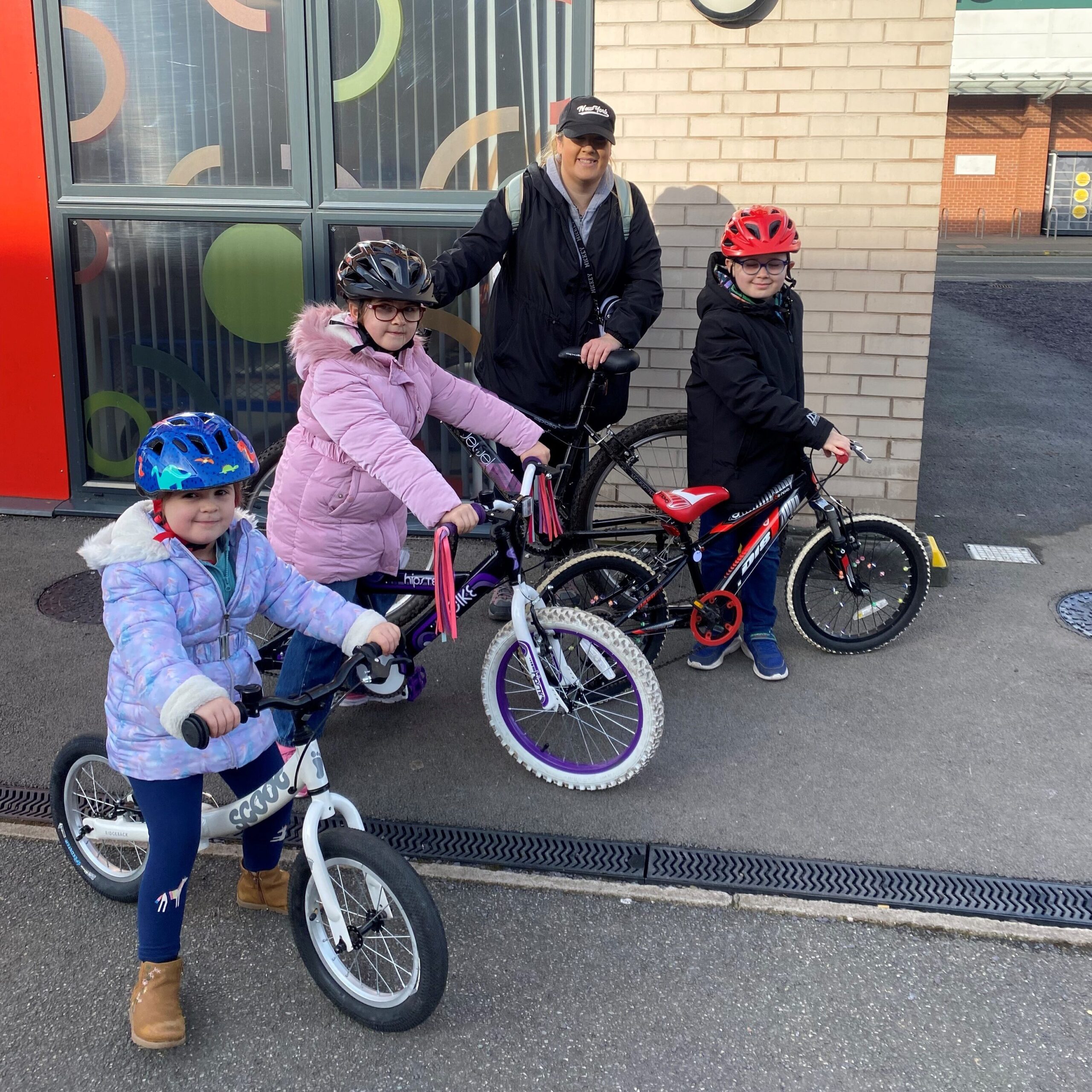A family at Leigh Bike Library