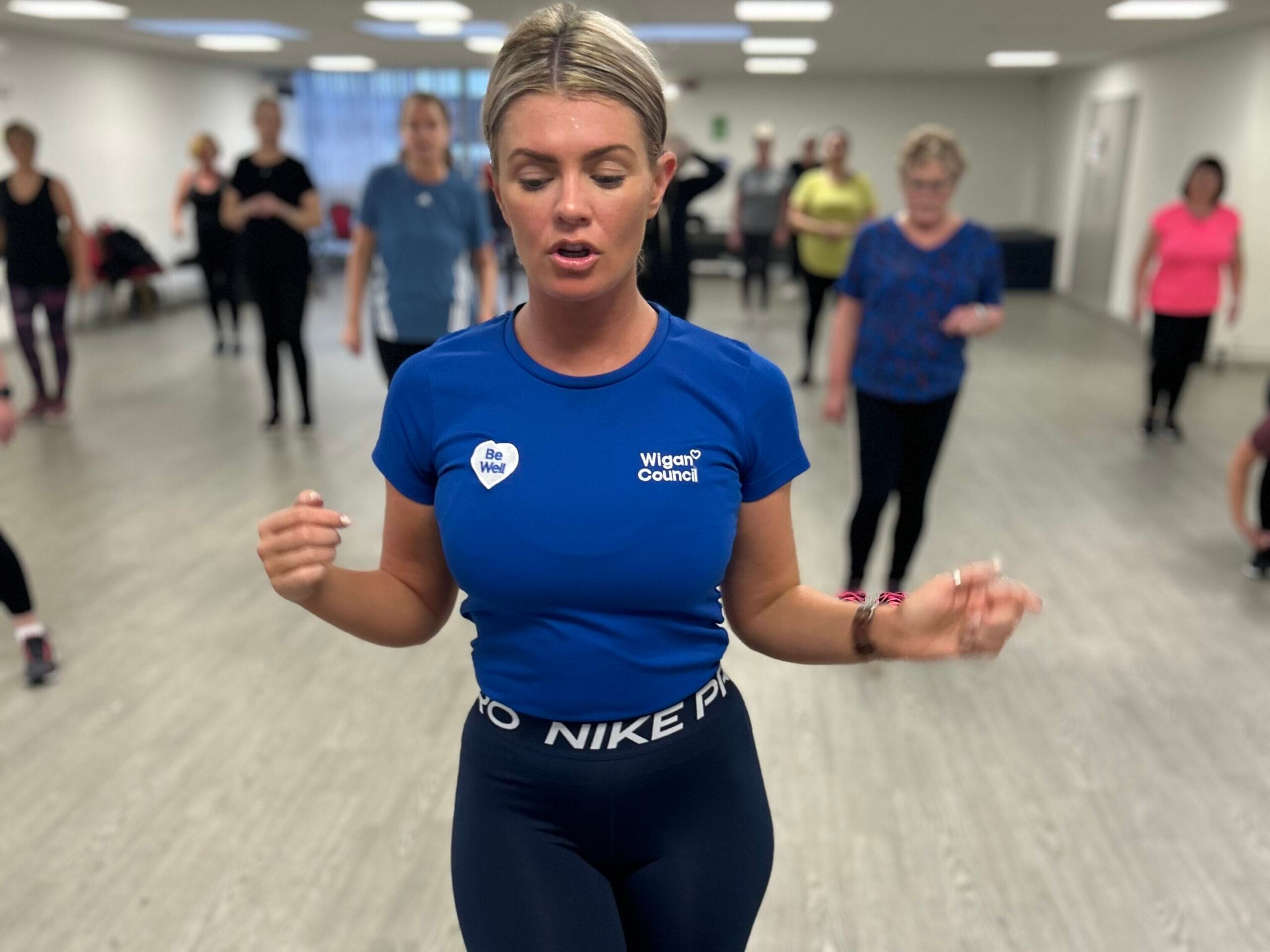 Danielle leading a dance class in a studio
