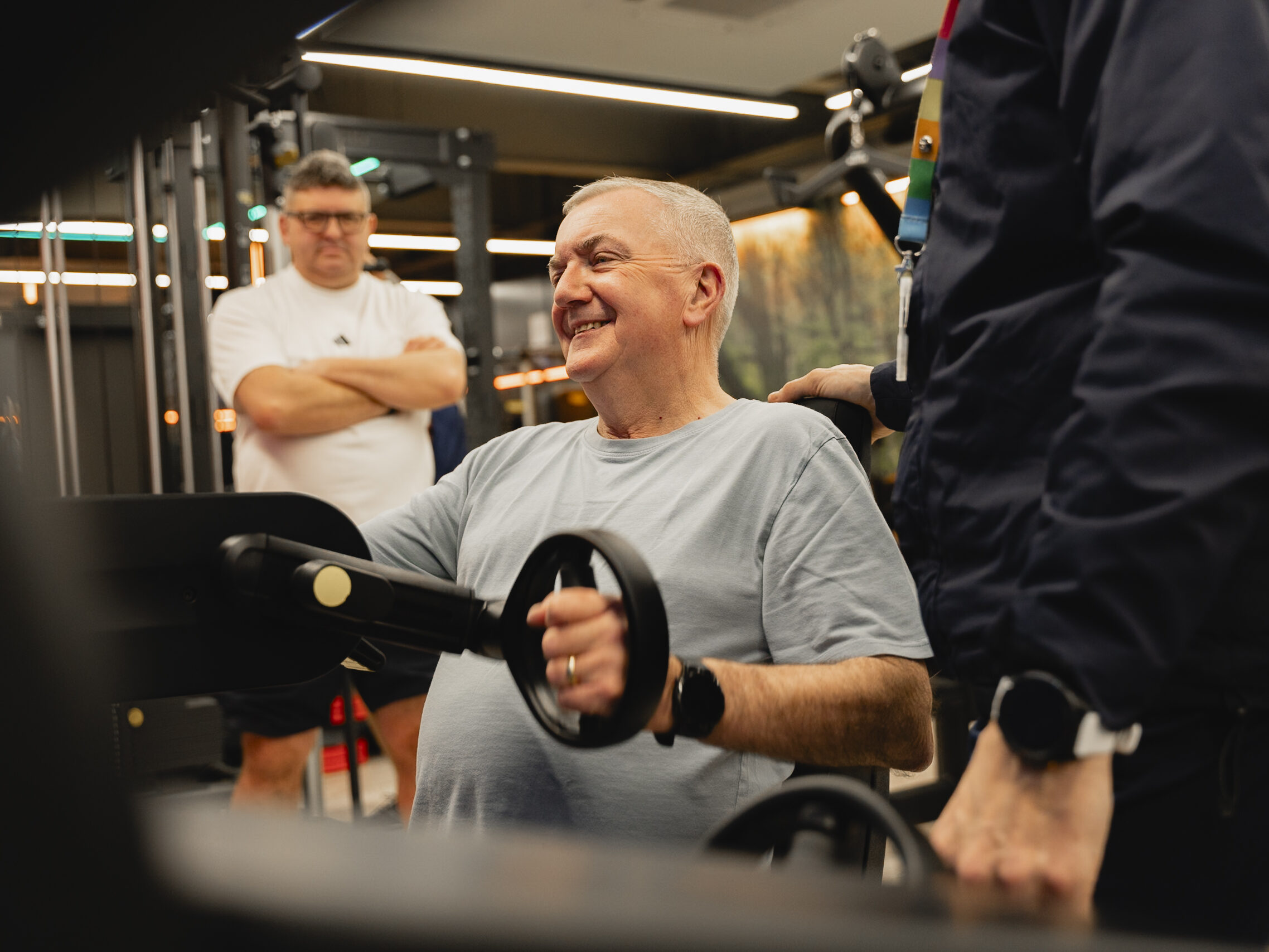Man using an arm bike at the gym
