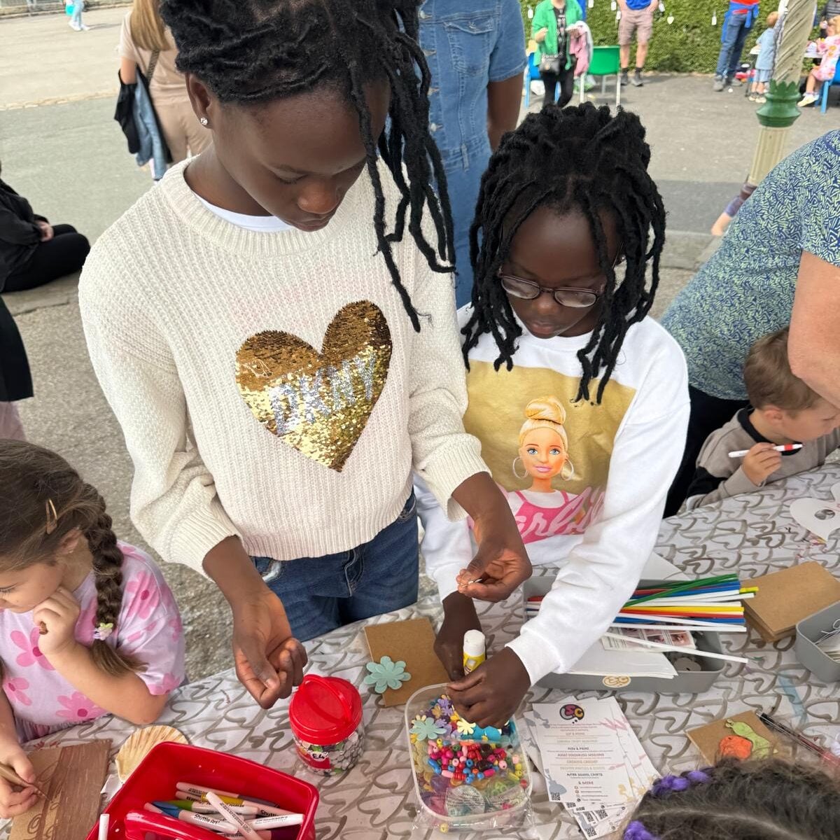 Children at an arts and crafts table